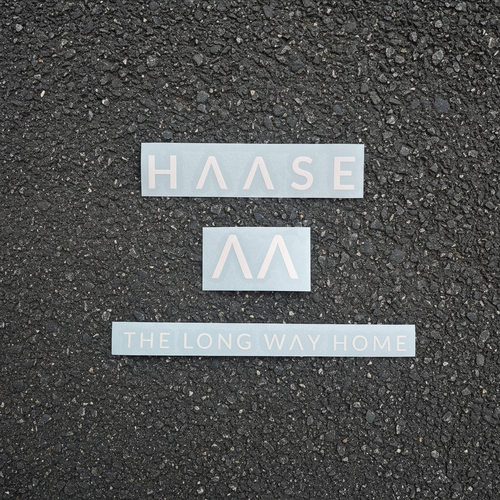 White stickers on tarseal